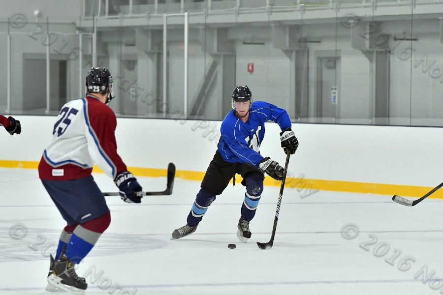 Wheaton College Men\'s Ice Hockey vs Middlesex Community College. - Photo By: KEITH NORDSTROM
